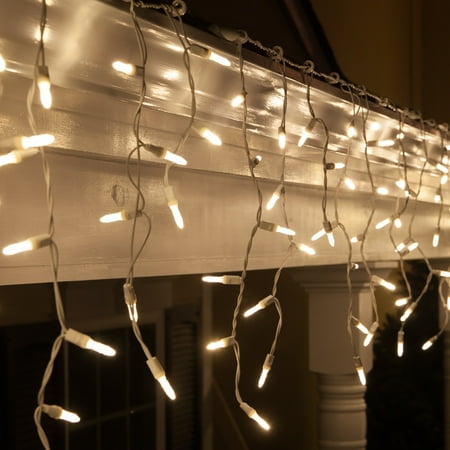 Wintergreen Lighting Mini Icicle Lights 70 Warm White LED Icicle Christmas Lights 7.5 Ft. , White Wire Indoor or Outdoor