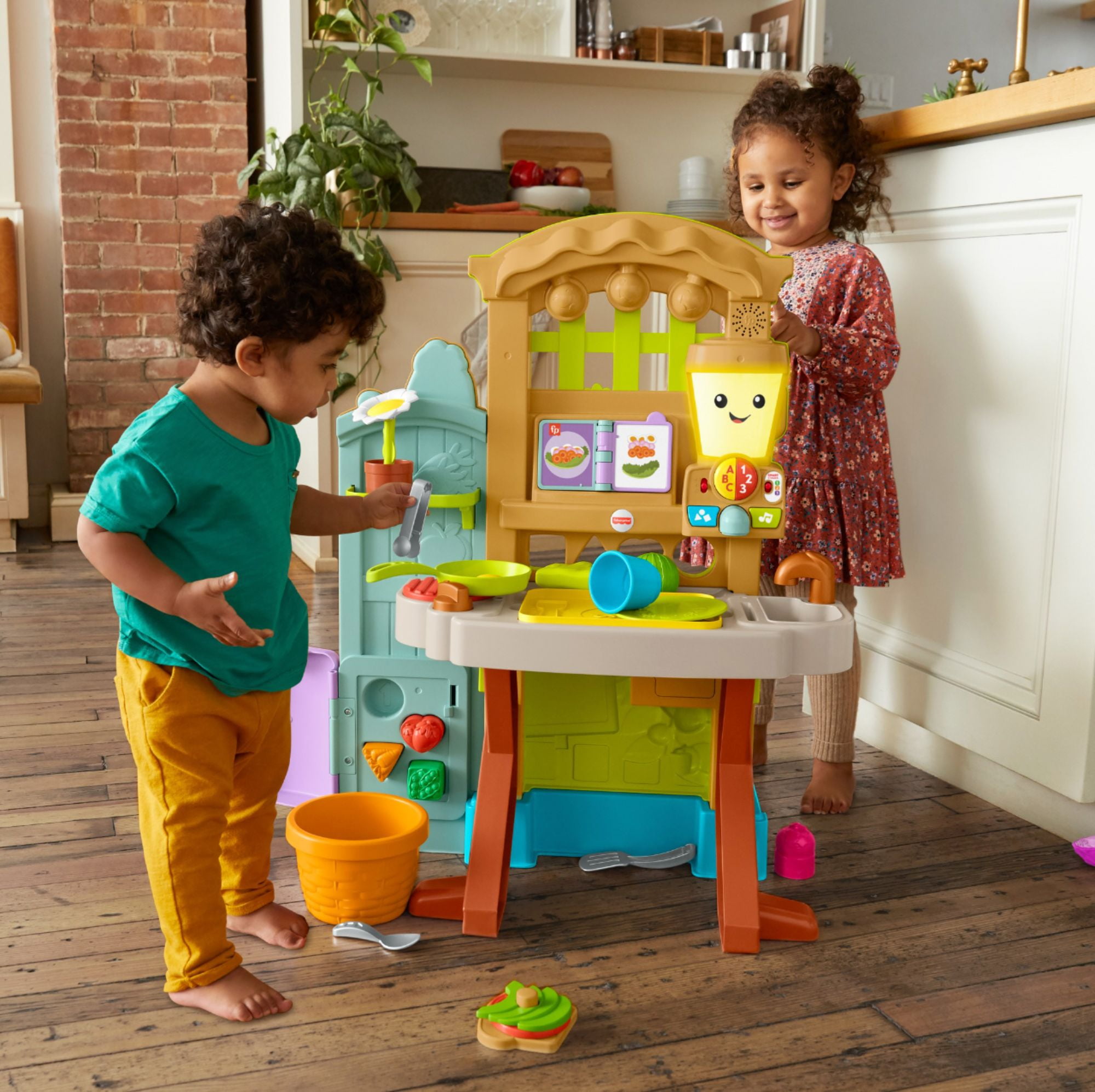 Fisher Price Garden to Kitchen interactive farm to kitchen playset for toddlers with music lights and learning content multi