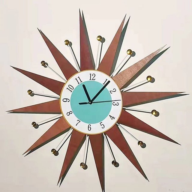 Reloj de pared moderno con movimiento de cuarzo, 18 pulgadas, PVC plano, estilo medieval, con diseño de estrella y sol, con diseño de ojo de cerradura para colgar, decoración de mediados de siglo