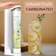 thumbnail image 2 of FIZZpod Soda Maker - Máquina de bebidas gaseosas con 3 botellas de PET, 3 tapas, 1 tapa carbonatadora y manual - Haga agua con gas, jugo, café, té y cócteles caseros con fruta (blanco), 2 of 5