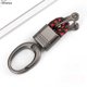 thumbnail image 1 of LLavero de coche de cuero tejido a mano para hombre y mujer Tan Jianjun unisex, 1 of 2