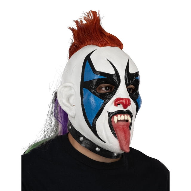máscara psyco clown ghoulish productions halloween Multicolor máscara de látex con rostro blanco pintado, cejas negras, cresta de pelo rojo erguido y mechones laterales morado y verde; vista 3/4 frontal sobre fondo blanco con camiseta negra; suele usarse para disfraces de Halloween y representaciones teatrales.