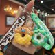 thumbnail image 5 of Llavero creativo con forma de donut de PVC de goma suave con forma de dinosaurio para coche, colgante de bolso para niños kawaii, accesorios de cumpleaños, 5 of 5