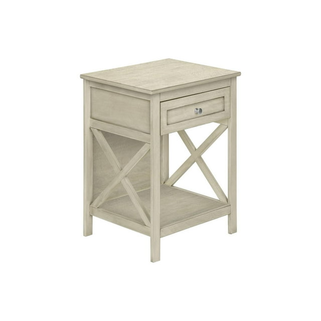 Two-tier antique white accent table with a single drawer and open shelf supported by X-shaped side panels.