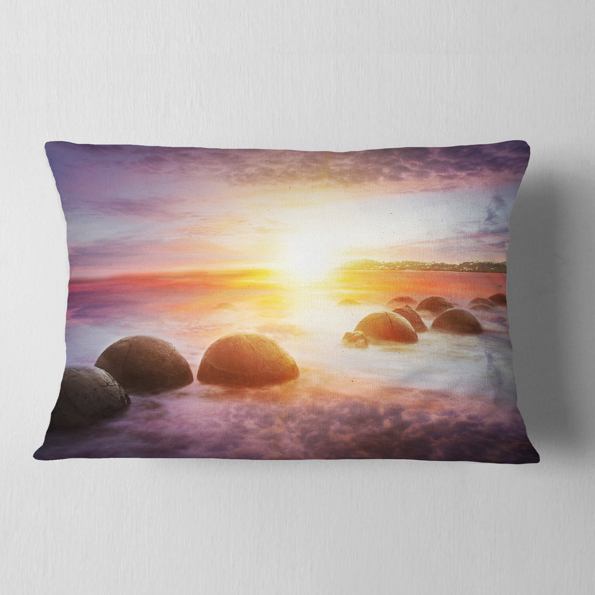 Designart Evening Sun Over Moeraki Boulders - Seashore Photo Throw Pillow - 12x20