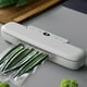 thumbnail image 1 of Máquina de vacío portátil para alimentos con 10 bolsas de vacío para ahorro de alimentos, minisellado rápido para conservación de alimentos, bolsas de Blanco Yotijar máquina selladora, 1 of 8