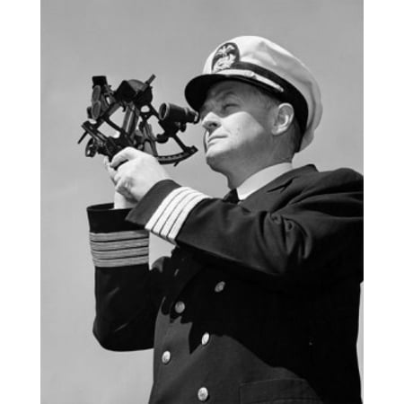 Low angle view of a ship captain looking through a sextant Canvas Art - (24 x 36)
