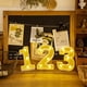 thumbnail image 5 of Lámpara LED decorativa con números dorados para fiestas, cumpleaños y propuestas románticas - Luz cálida sin pilas incluidas (Modelo 5), 5 of 6