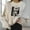 Beige-2, variant on Women's Halloween Sweatshirts Skull Graphic Long Sleeve Loose Fit Pullover Gothic Fall Casual Tops