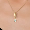 thumbnail image 3 of Gem Stone King 14K Yellow Gold Sky Blue Topaz and Lab Grown Diamond Pendant Necklace for Women | 0.53 Cttw | Gemstone November Birthstone | Oval 6X4MM | With 18 inch Chain, 3 of 6