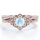 thumbnail image 1 of JeenMata Anillo de Bodas con Banda Retorcida Infinita de Piedra Lunar Azul y Moissanita de Corte Redondo de 1,75 Quilates con Bisel de Halo de Flores Engastado en Oro Rosa de 18 K sobre Plata, 1 of 6