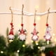 thumbnail image 1 of Adornos de madera para árbol de Navidad | Juego de 12 colgantes | Figuras de Papá Noel para decoración navideña | Diseños de personajes surtidos, 1 of 3