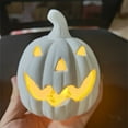 thumbnail image 1 of Ceramic Pumpkin Ornament | White Hollow Openwork Christmas Pattern | LED Lighted Festive Decor | Quirky Holiday Table Centerpiece | Durable Easy-to-Clean Material | 1 Piece, 1 of 9