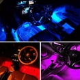thumbnail image 1 of Tira de luces LED para automóvil 48LED DC12V Música multicolor Luz interior del automóvil Kit de luces LED debajo del tablero con función de sonido activo y control remoto inalámbrico Cargador de auto, 1 of 5