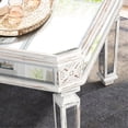 thumbnail image 2 of Vintage Carved Elements on Mirrored Table / In Primary Living Area / Artistic and Functional, 2 of 6