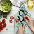 thumbnail image 3 of Tree of Life Cutting Board, Heart Shaped Bird Nest Home Words Hope Family Partners in Nature, Decorative Tempered Glass Cutting and Serving Board, Wine Bottle Shape, Black Green Pink, by Ambesonne, 3 of 5