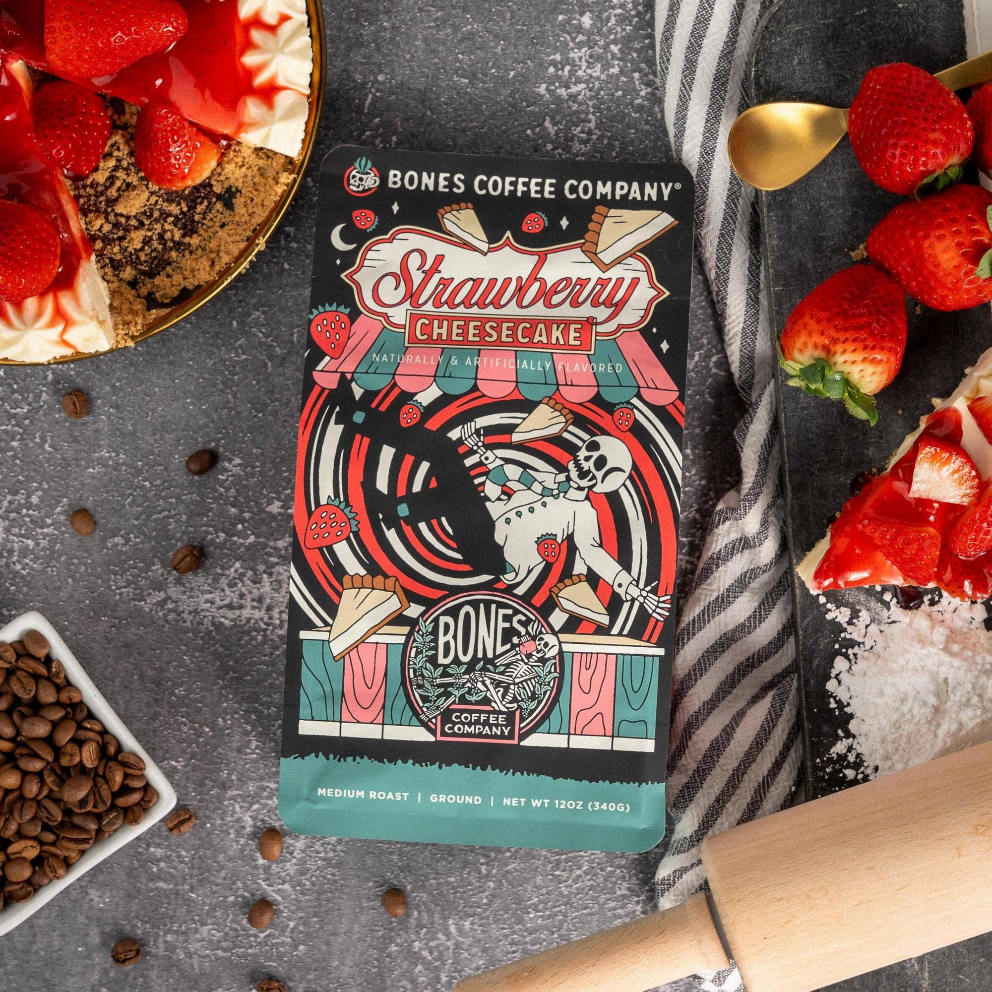 Bones Coffee Company Strawberry Cheesecake Ground Coffee Beans, Low Acid Flavored Coffee, Made with Arabica Coffee Beans, Medium Roast Gourmet Coffee (12 oz)