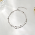 thumbnail image 3 of Pulsera de doble anillo geométrico de plata S925 para mujer, diseño de nicho de lujo ligero, anillo enlazado, joyería de alta gama para novia, 3 of 5