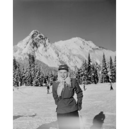 USA Washington near Seattle woman skier with mountains in background Stretched Canvas -  (18 x