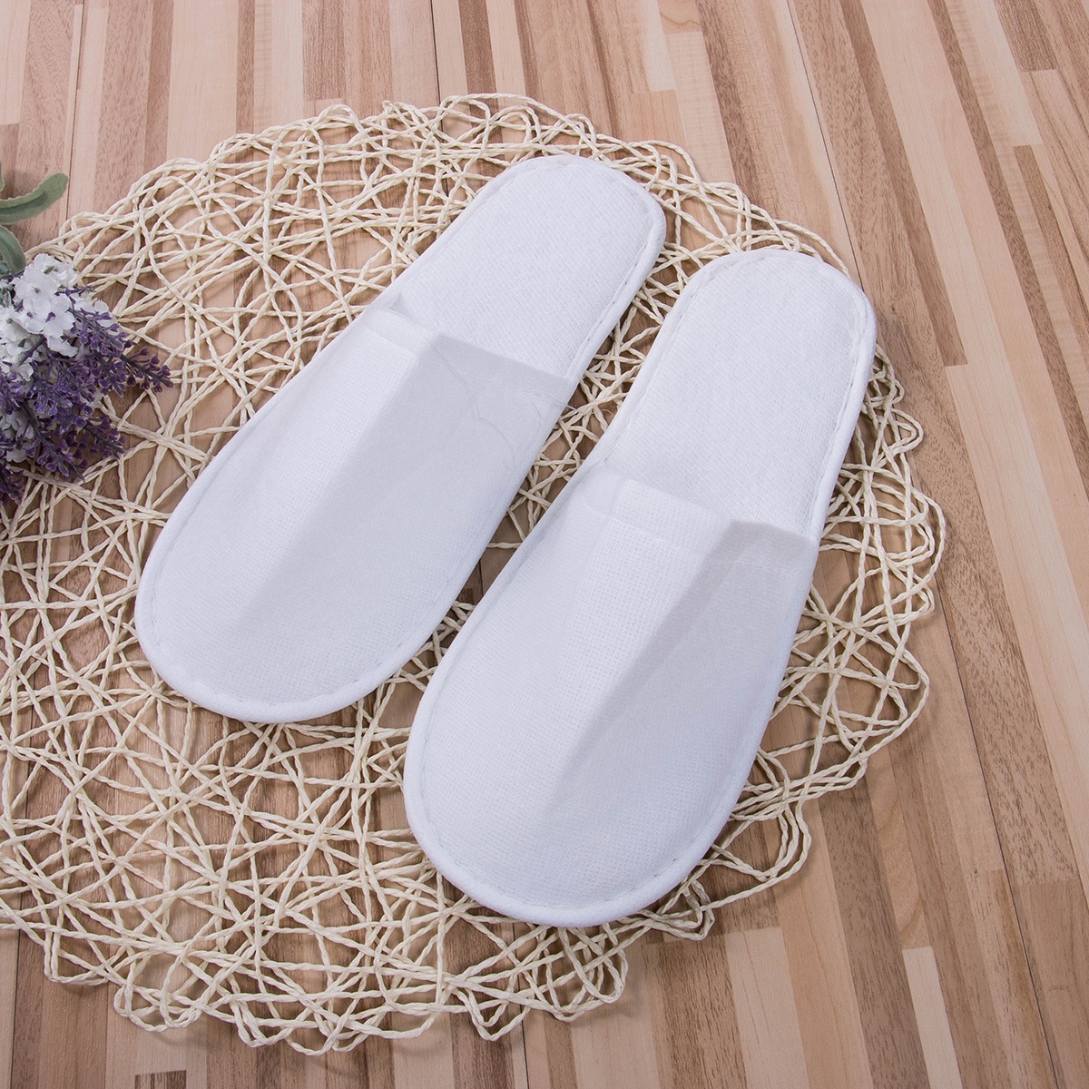 white hotel slippers