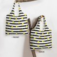 thumbnail image 3 of Xecao's Lemon_1 Canvas Tote Bag is a versatile choice for women, serving as a stylish beach bag, shopping bag,and reusable grocery bag., 3 of 5
