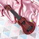 thumbnail image 5 of Juguete para tocar con cuatro cuerdas (44cm, marrón) de mini guitarra de ukelele imitada para niños, con instrumentos musicales pequeños., 5 of 5