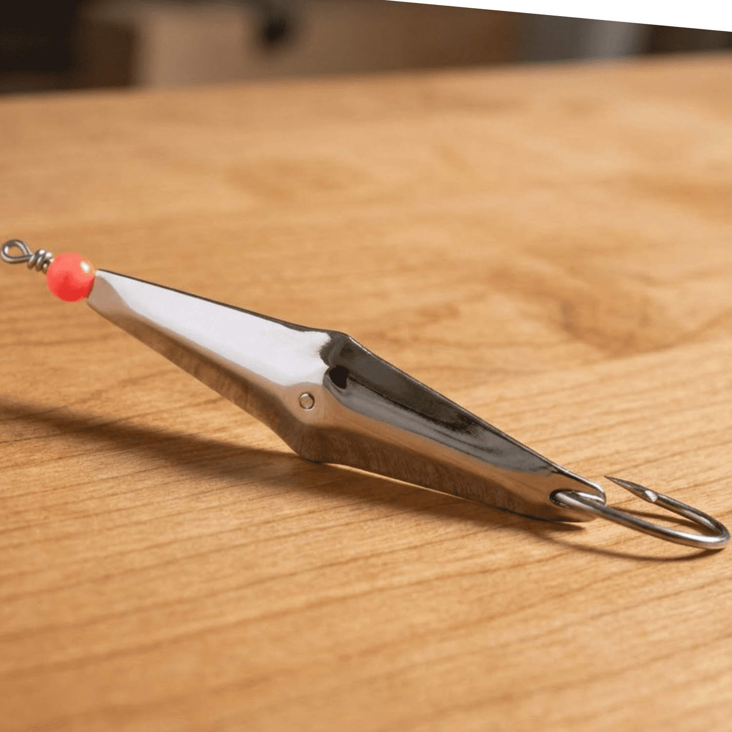 Tsunami Sea Spoon Fishing Lure 2 in Size 2/0 with Red Bead.