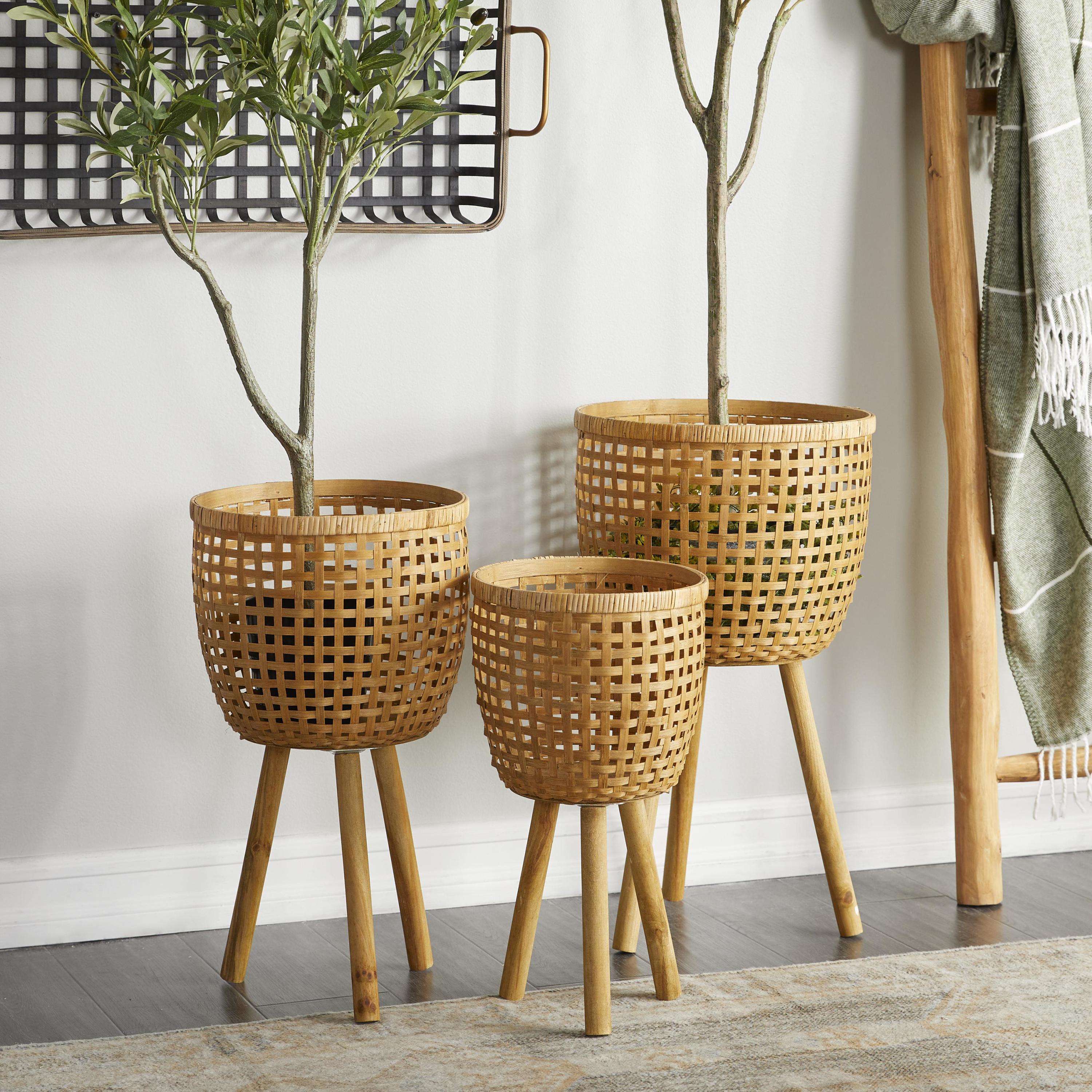 DecMode 26", 23", 20"H Handmade Woven Basket Brown Bamboo Wood Planter with Wooden Tripod Legs (3 Count)