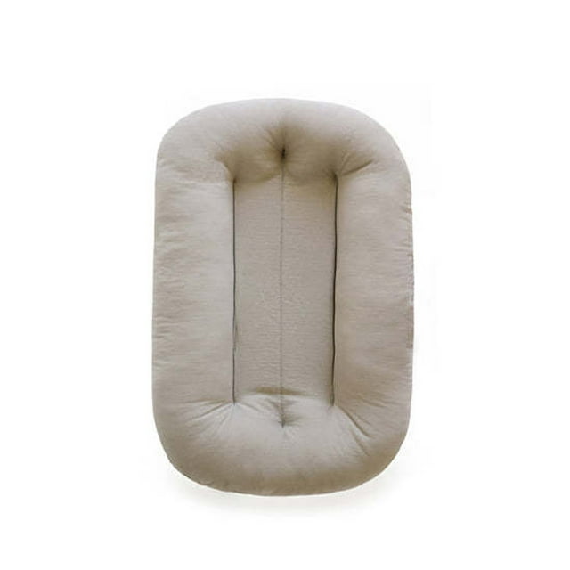 Portable Baby Sleeping Mat Breathable Cotton Womb Environment Design for Newborns. A lightweight, foldable travel crib mattress measuring 60cm, crafted from breathable cotton in a soft grey color. The mat features a womb-like design with gentle, soft edges to reduce startle reflex and promote better sleep for newborns. Ideal for use at home, in the car, or during travel, it folds flat for compact storage and easy portability.
