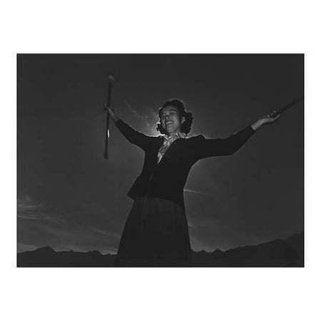 Florence Kuwata three-quarter length portrait standing arms outstretched holding a baton in each hand  Ansel Easton Adams was an American photographer best known for his black-and-white photographs (Best Telescopic Stun Baton)