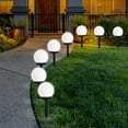 thumbnail image 1 of Decoración de jardín impermeable para patios, terrazas y caminos: paquete de 6 luces LED solares en forma de globo de color blanco frío, 1 of 8