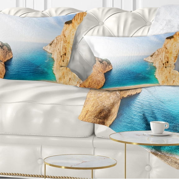 Designart Blue Sea in Between Big Rocks - Seashore Throw Pillow - 12x20