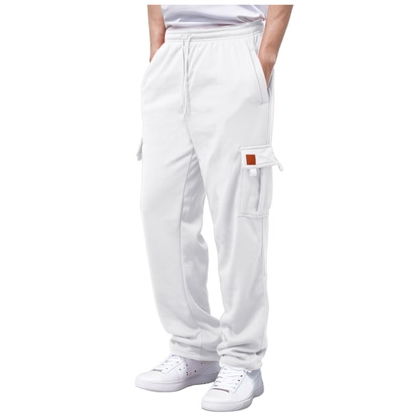 Pantalones de running para hombre: cintura con cordón, corte holgado, transpirables. Pantalones de poliéster con bolsillos laterales.