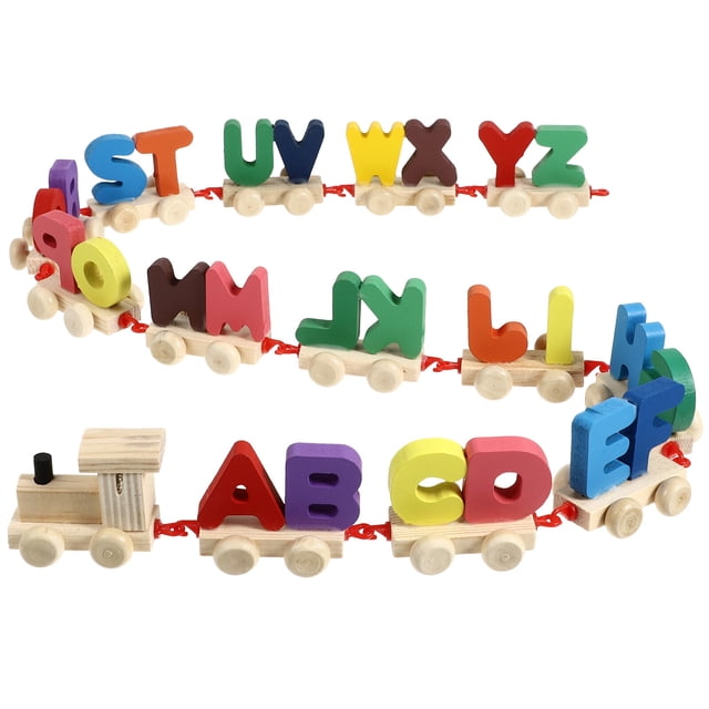 tren magnético de madera con letras del alfabeto, juguetes educativos tempranos, mini tren de letras para niños pequeños, niños y niñas — locomotora y 26 vagones alineados en curva, cada vagón con una letra mayúscula de madera pintada en colores surtidos; ruedas de madera claras, ganchos rojos de unión y borde pulido visibles; tamaño aprox. 17.8 x 10.2 x 9.5 cm. Adecuado para aprender letras y practicar habilidades motoras finas en niños pequeños; también suele usarse como decoración infantil.