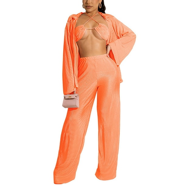 orange shirt with black pants