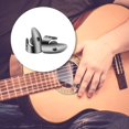 thumbnail image 5 of El juego de 12 púas para el pulgar con púa ajustable contiene 8 púas para el pulgar de acero inoxidable plateadas y 4 púas de plástico para el pulgar para guitarra, banjo, arpa y bajo., 5 of 5