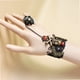 thumbnail image 3 of KAKOWELY Pulsera de encaje negro con cadena de mano de calavera pirata para mujer, accesorios para fiesta de Halloween, 3 of 5