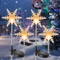 thumbnail image 1 of Juego de 4 luces solares con forma de copos de nieve con forma de copos de nieve, 1 of 8