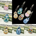 thumbnail image 1 of Jewelry Gifts Cartoon Doll Shape  Keychain,  Painting Keychain, For Student Children, 1 of 8
