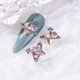 thumbnail image 1 of Joyas de aleación para decoración de uñas, taladro de corazón torcido, cruz, planeta, uña tridimensional con joyería de taladro, 1 of 5