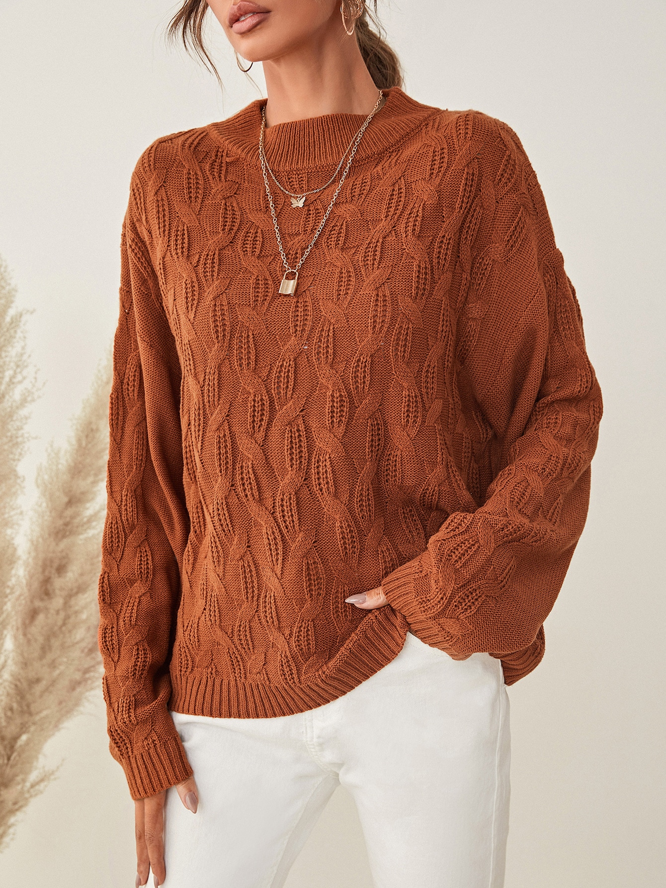 rust colored cable knit sweater