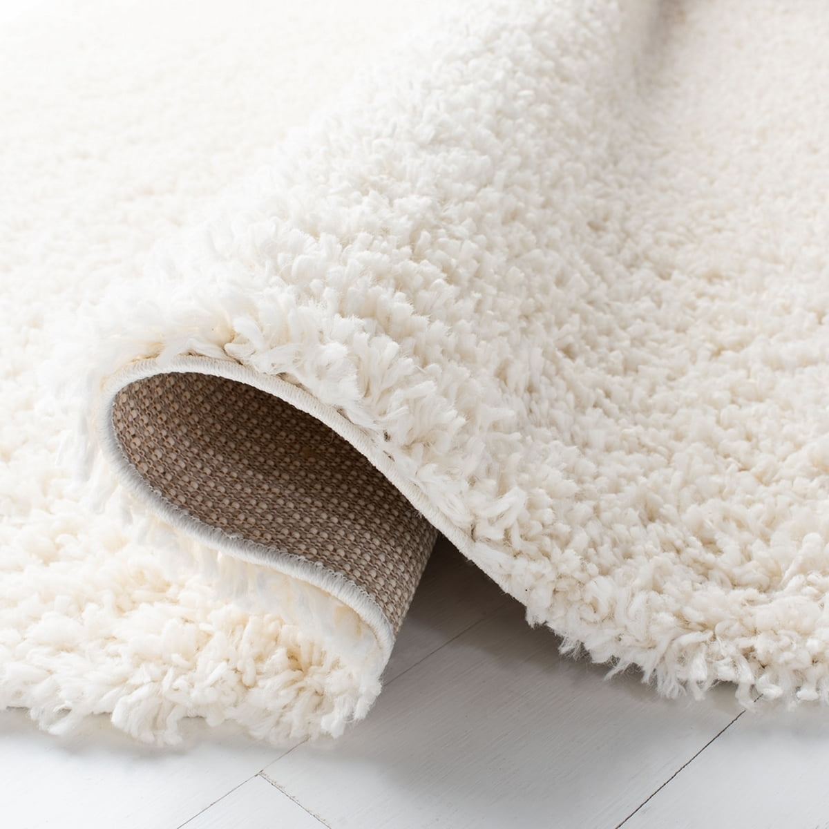 SAFAVIEH August Sophia Solid Plush Shag Area Rug, Ivory, 5'3" x 7'6"