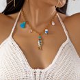 thumbnail image 3 of PISONIC Women Gold-Tone Chain Choker Necklace, Boho Ocean Statement Necklace with Blue Fish Pendant, Tassel, Imitation Pearl & Clear Beads, Summer Beach Vacation Casual Jewelry, 3 of 6