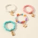 thumbnail image 5 of Anillo Con Cuentas De Flores, Anillos Coloridos Con Cuentas De Arroz, Anillos De Joyería, Regalos Para Mujeres Y Niñas 4 Uds Minnieouse AP005883-00, 5 of 6