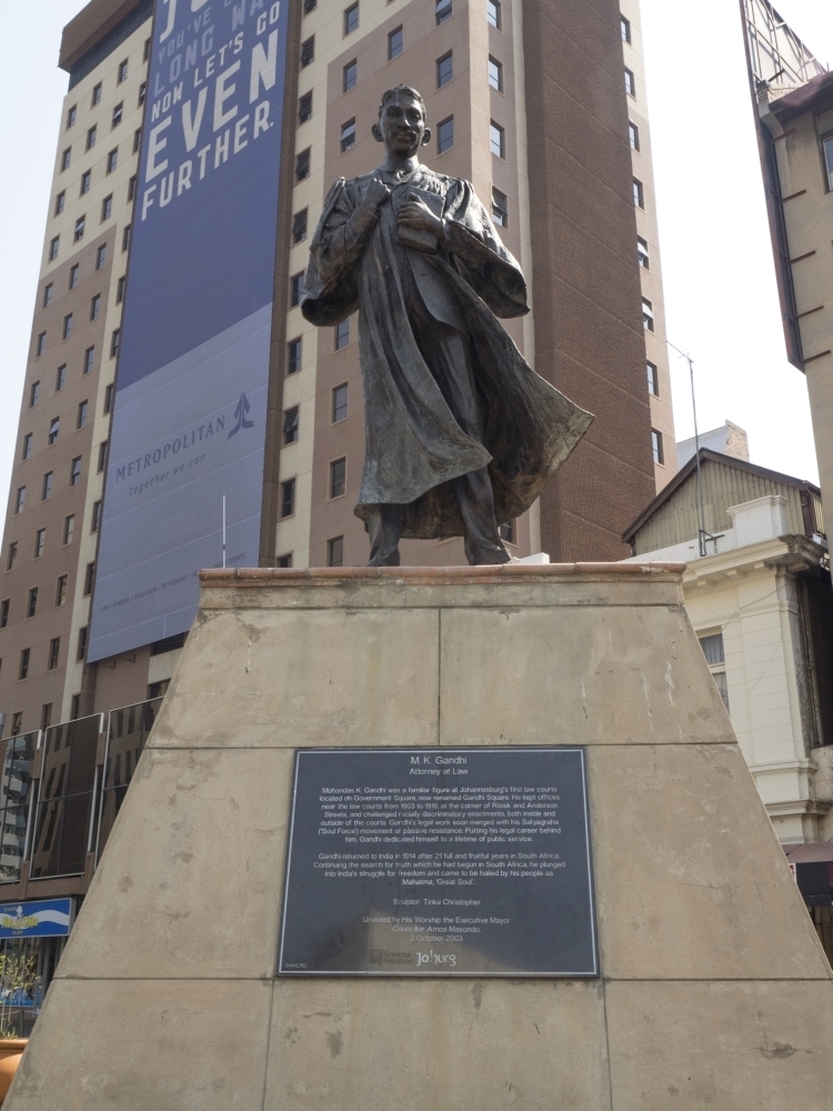 Low angle view of Mahatma Gandhi Statue at Gandhi Square Johannesburg