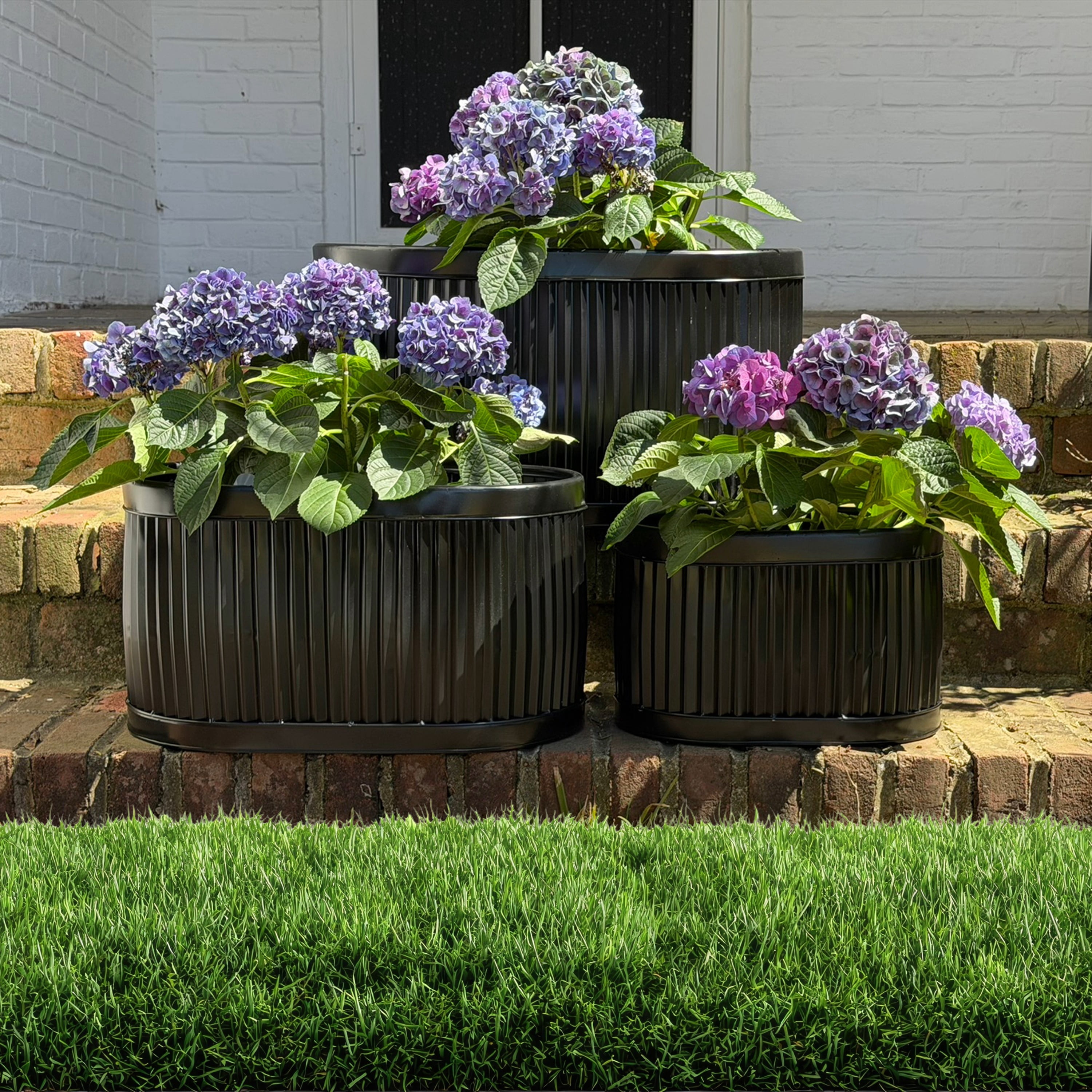 WHW Whole House Worlds French Country Style Oval Planters, Set of 3, Glossy Black, Galvanized Metal, Chubby Ripple Belly, Corrugated Cache Pots, Rustic, Over 2 ft., 24.5, 20 and 14.5 Inches