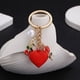 thumbnail image 2 of Llavero con forma de corazón, perla rosa roja y colgante en forma de corazón, 2 of 2