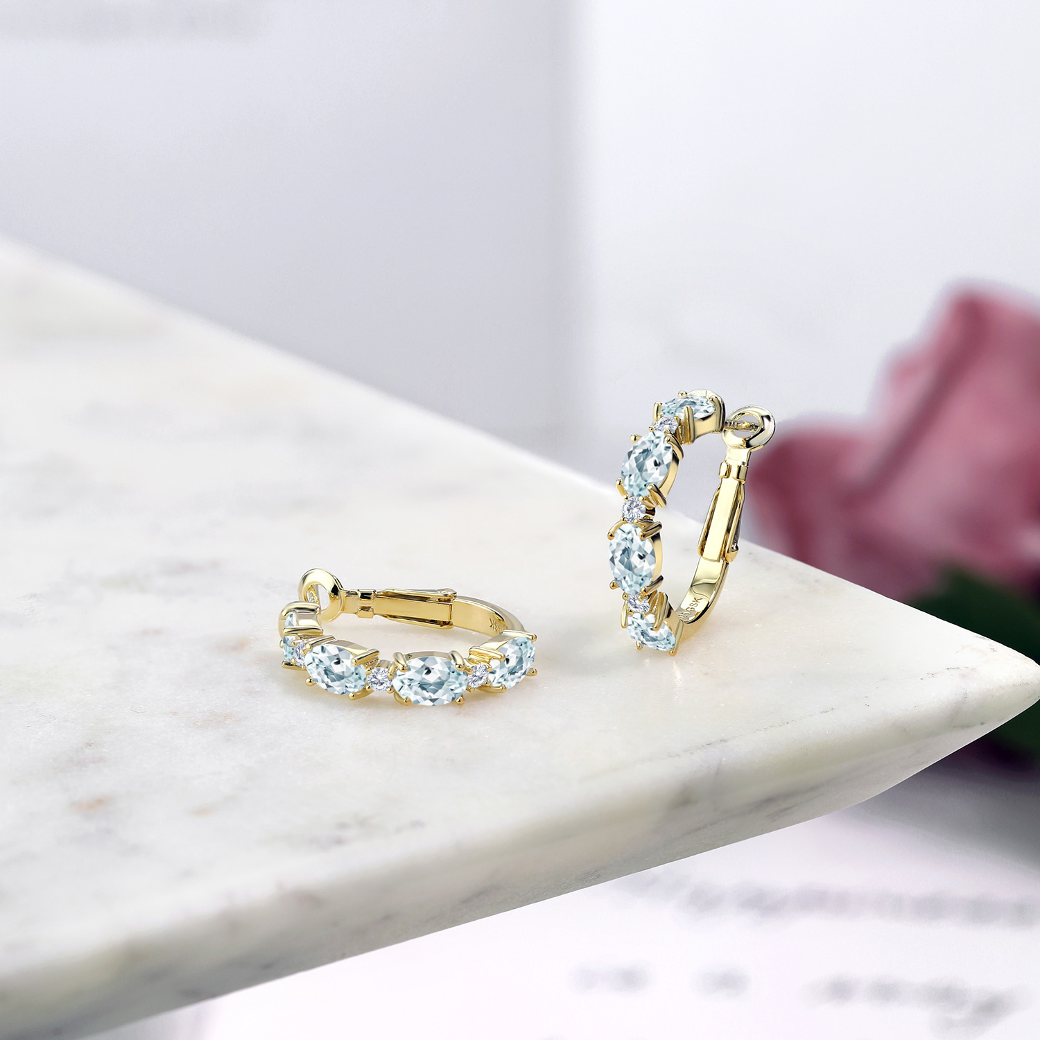 Gem Stone King 18K Yellow Gold Plated Silver Hoop Earrings for Women | Sky Blue Aquamarine and Moissanite | 4.23 Cttw |. Oval 6X4MM and Round 2MM | Fine Jewelry Gifts for Women Mom Wife Her