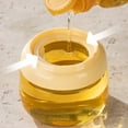 thumbnail image 4 of Botella de aceite de aceite de vidrio segura para altas temperaturas con cepillo para rociar | Dispensación precisa de aceite y condimentos | Tapa a prueba de fugas | Control manual de boquilla |, 4 of 6