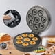 thumbnail image 3 of Mini máquina para hacer donas, 7 agujeros, antiadherente y con calentamiento por ambos lados, ideal para desayunos y postres infantiles., 3 of 3